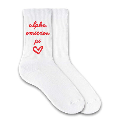 Alpha Omicron Pi sorority name in sorority colors digitally printed with heart on white cotton crew socks.