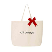 Chi Omega sorority name digitally printed on canvas tote bag with red bow.