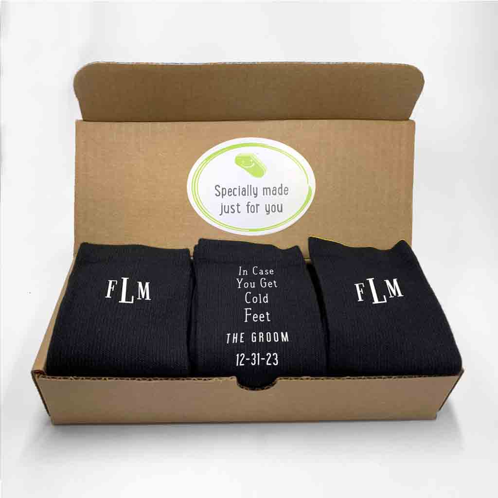 Custom printed monogrammed wedding socks for the groom in a three pair gift box set.