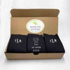 Custom printed monogrammed wedding socks for the groom in a three pair gift box set.