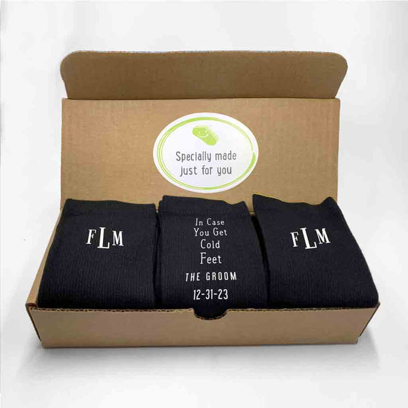 Custom printed monogrammed wedding socks for the groom in a three pair gift box set.