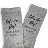 Personalized wedding day socks custom printed for the groom personalized with your names and wedding date digitally printed on the side of the heather gray crew socks.