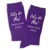 Personalized wedding day socks custom printed for the groom personalized with your names and wedding date digitally printed on the side of the purple flat knit dress socks.