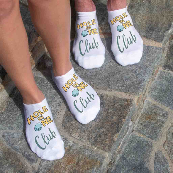 The perfect novelty golf socks for your favorite golfer these hole in one club design printed on the top of white cotton blend no show socks.