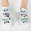 Super cute pickleball socks digitally printed with Dinking is my happy hour on the top of the white no show socks. Makes a great pickleball gift