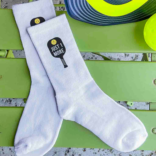 Just one more pickleball design by sockprints custom pirnted on the side of white cotton no show socks.