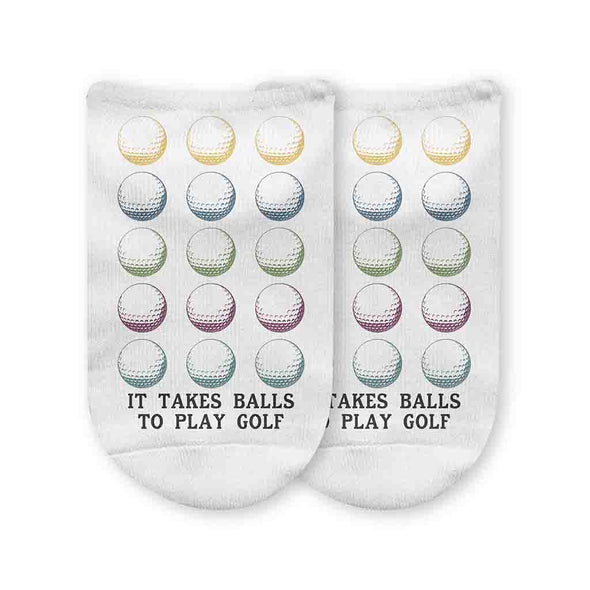 Funny golf socks for him or her digitally printed with it takes balls to play golf and golf balls design on comfy white cotton no show socks.
