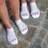It takes balls to play golf custom printed with golf balls design on comfy white cotton no show socks is a unique gift for your favorite golf fan.