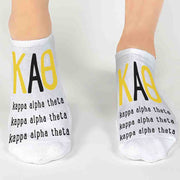Kappa Alpha Theta sorority letters and name digitally printed on white no show socks.