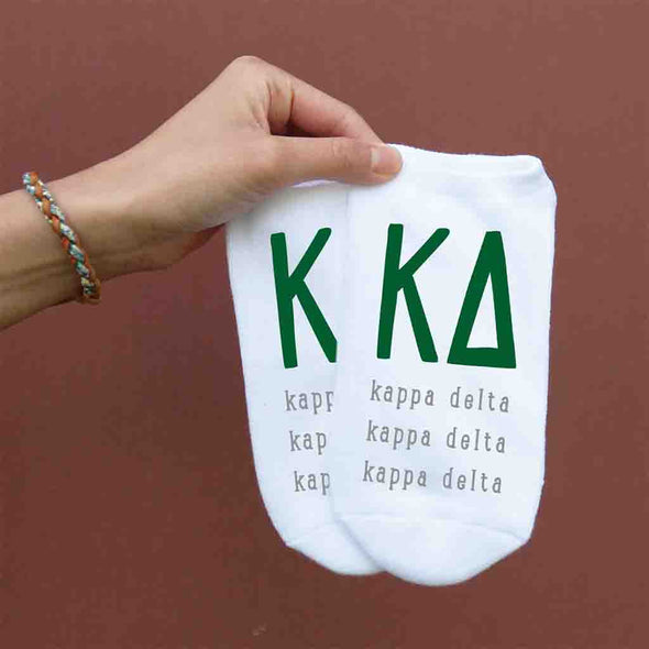 Kappa Delta sorority letters and name digitally printed in sorority colors on white no show socks.