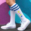 Pickleball design custom printed by sockprints on the side of striped knee high socks.