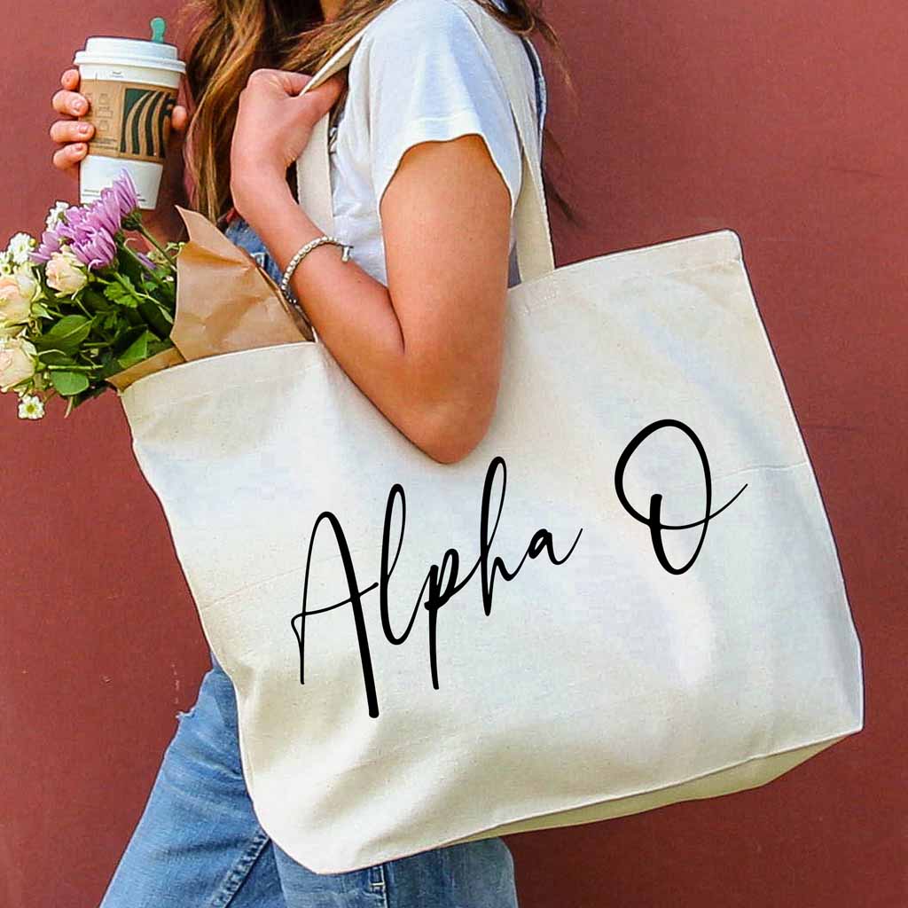 Alpha Omicron Pi sorority nickname digitally printed on canvas tote bag in script writing is a the perfect accessory for the new semester.