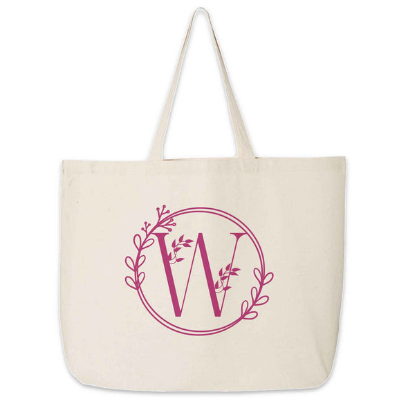 Large monogrammed bridesmaid tote bag personalized with a floral theme design.