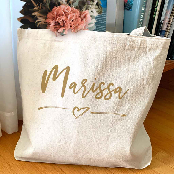 Super cute roomy canvas tote bag digitally printed with your name and heart design.