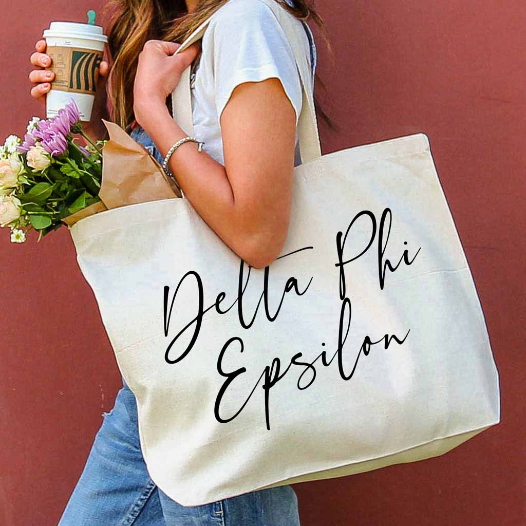Delta Phi Epsilon sorority nickname custom printed on roomy canvas tote bag is a great accessory for your college years.