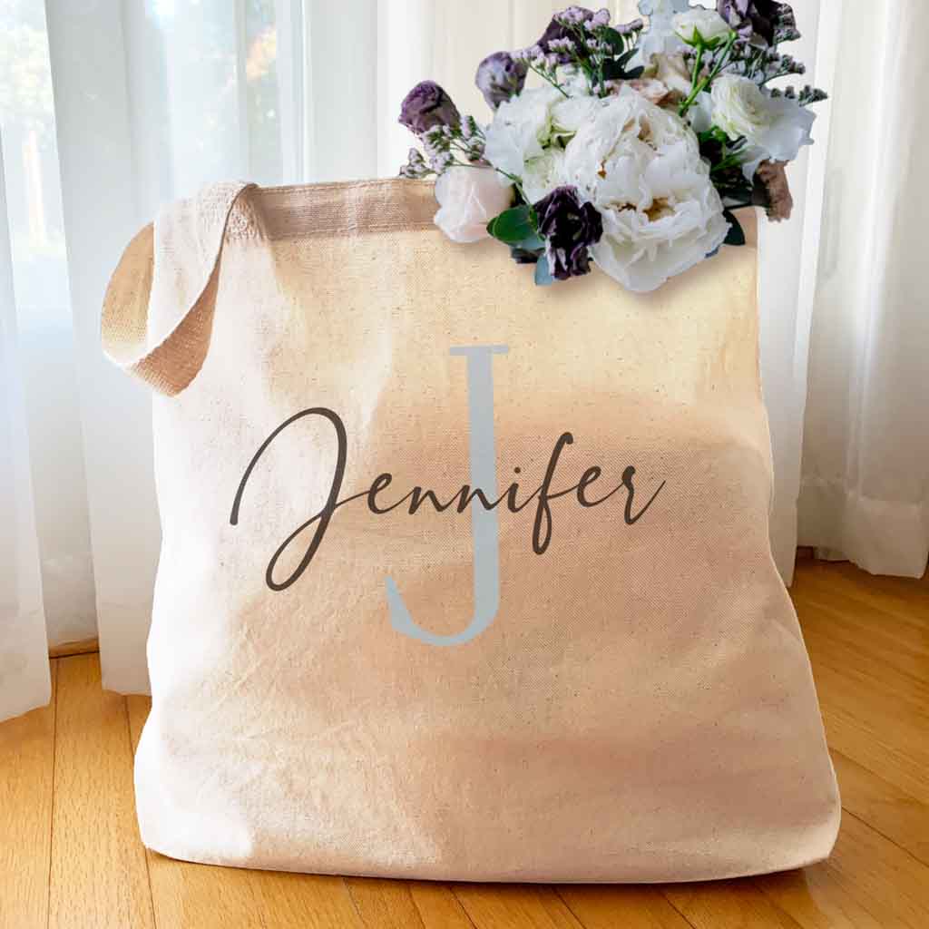 Large roomy canvas tote bag personalized with monogram and name.