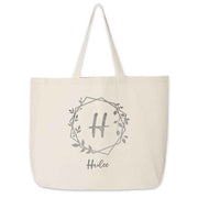 Canvas tote bag for the bridal party customized with your monogram and name.