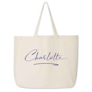 Roomy canvas tote bag for the bridal party personalized with a stylized name and design.