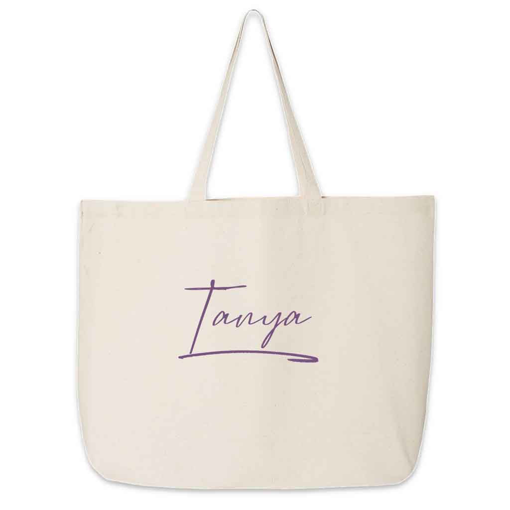 Roomy canvas tote bag for the bridal party personalized with a stylized name and design.