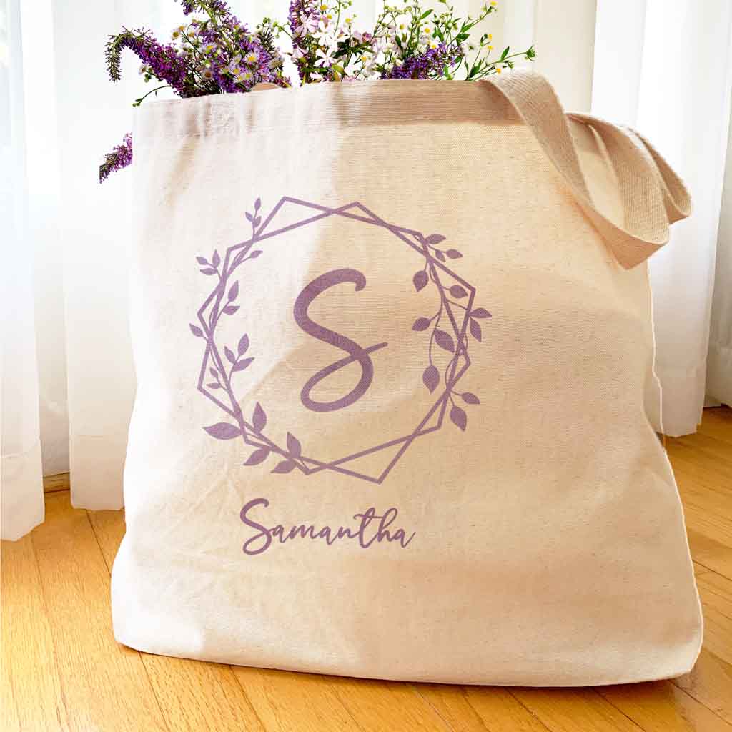 Roomy canvas tote bag personalized with name and monogram.