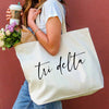 Tri Delta roomy canvas tote bag digitally printed with sorority nickname makes the perfect accessory for your first semester of college.