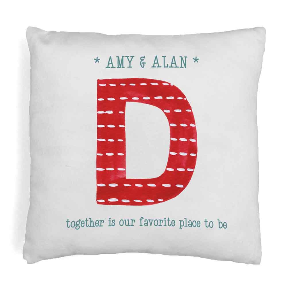White pillow cover digitally printed with cute holiday design and personalized with your initial and names.