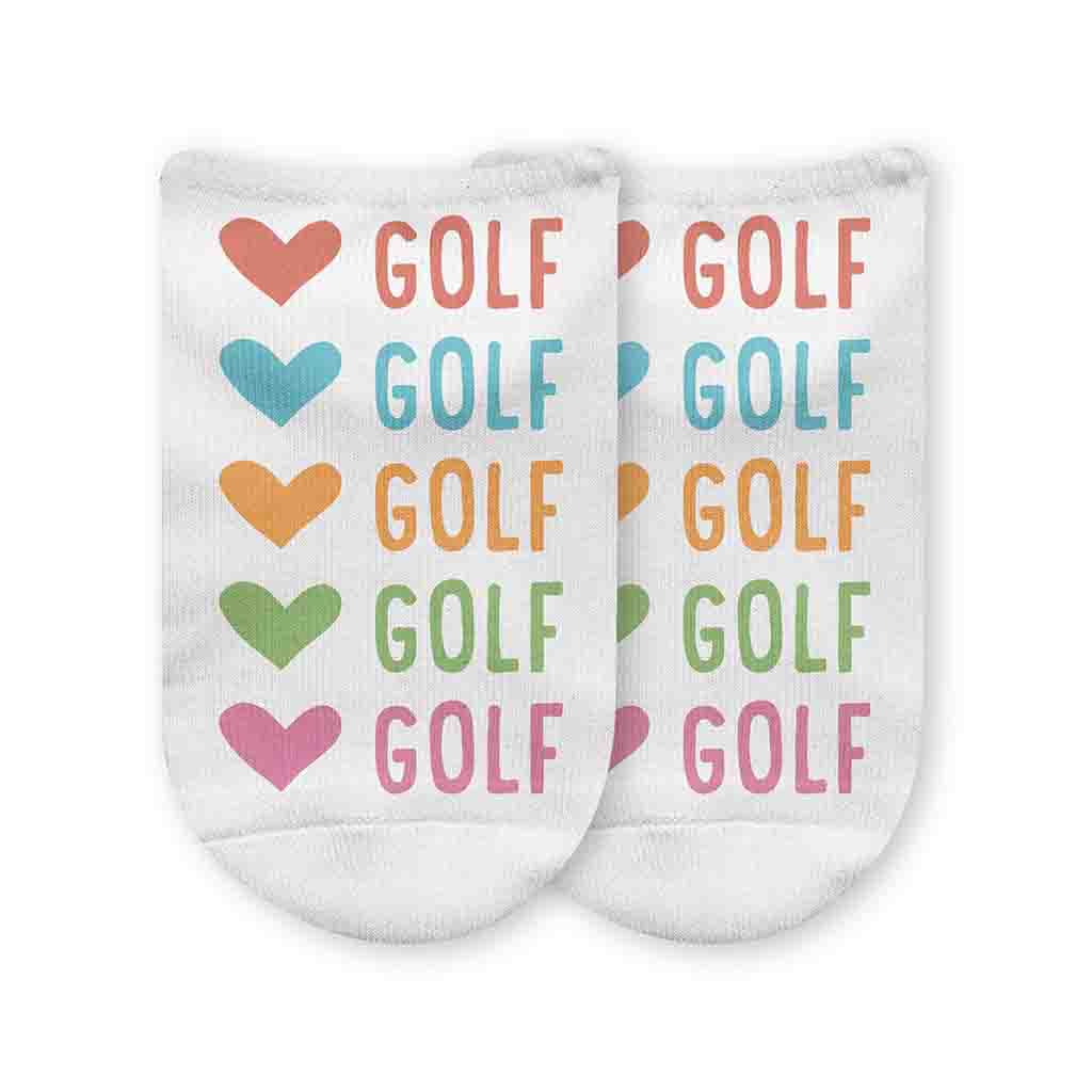 Colorful hearts and golf design digitally printed on the top of the white cotton blend no show socks is the perfect accessory for your favorite golf fan.