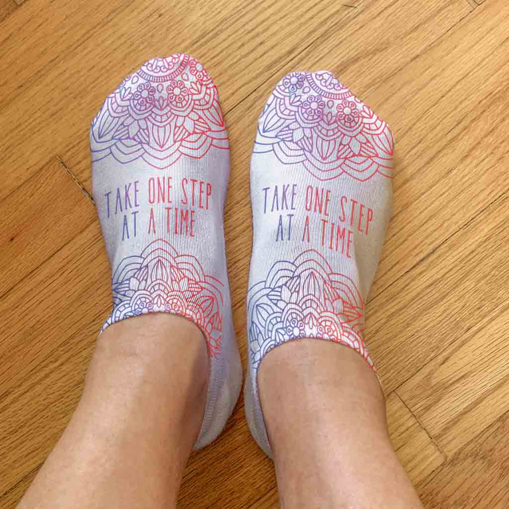 Comfortable white cotton no show socks custom printed with cute mandala design and self affirmation take one step at a time.