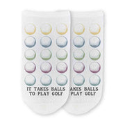 The perfect gift for your favorite golfer these it takes balls to play golf with golf digitally printed with golf ball design on white cotton no show socks.