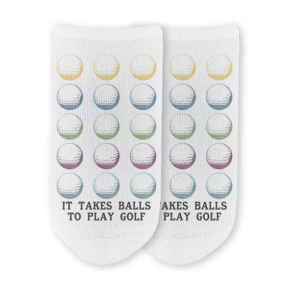 The perfect gift for your favorite golfer these it takes balls to play golf with golf digitally printed with golf ball design on white cotton no show socks.