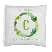 Personalized accent throw pillow cover with a tropical leaf design personalized with your monogram initial printed.