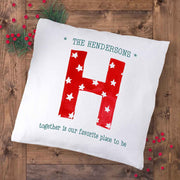Custom printed holiday pillow cover with monogram and name printed.