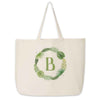 Large canvas tote bag personalized monogram with a tropical leaf design.