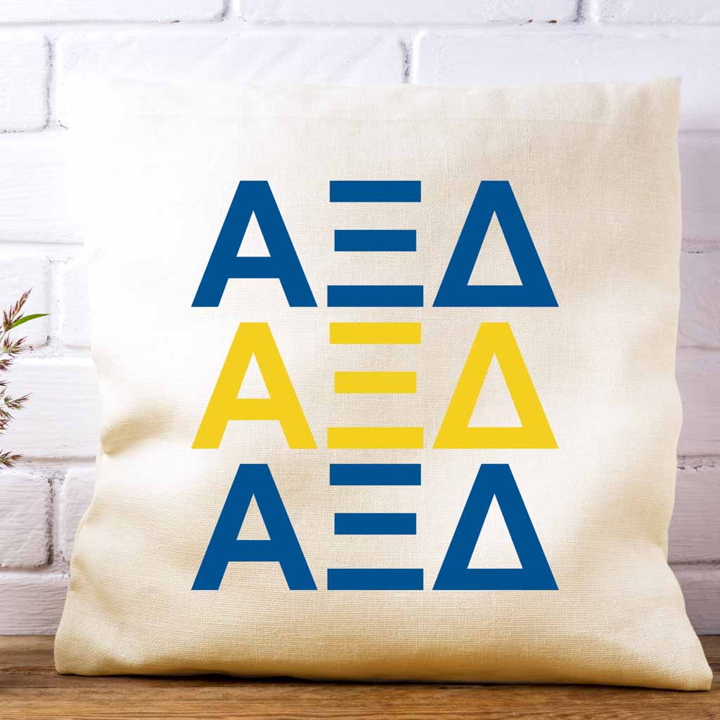 Alpha Xi Delta sorority letters digitally printed in sorority colors on throw pillow cover.