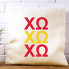 Chi Omega sorority letters digitally printed in sorority colors on throw pillow cover.