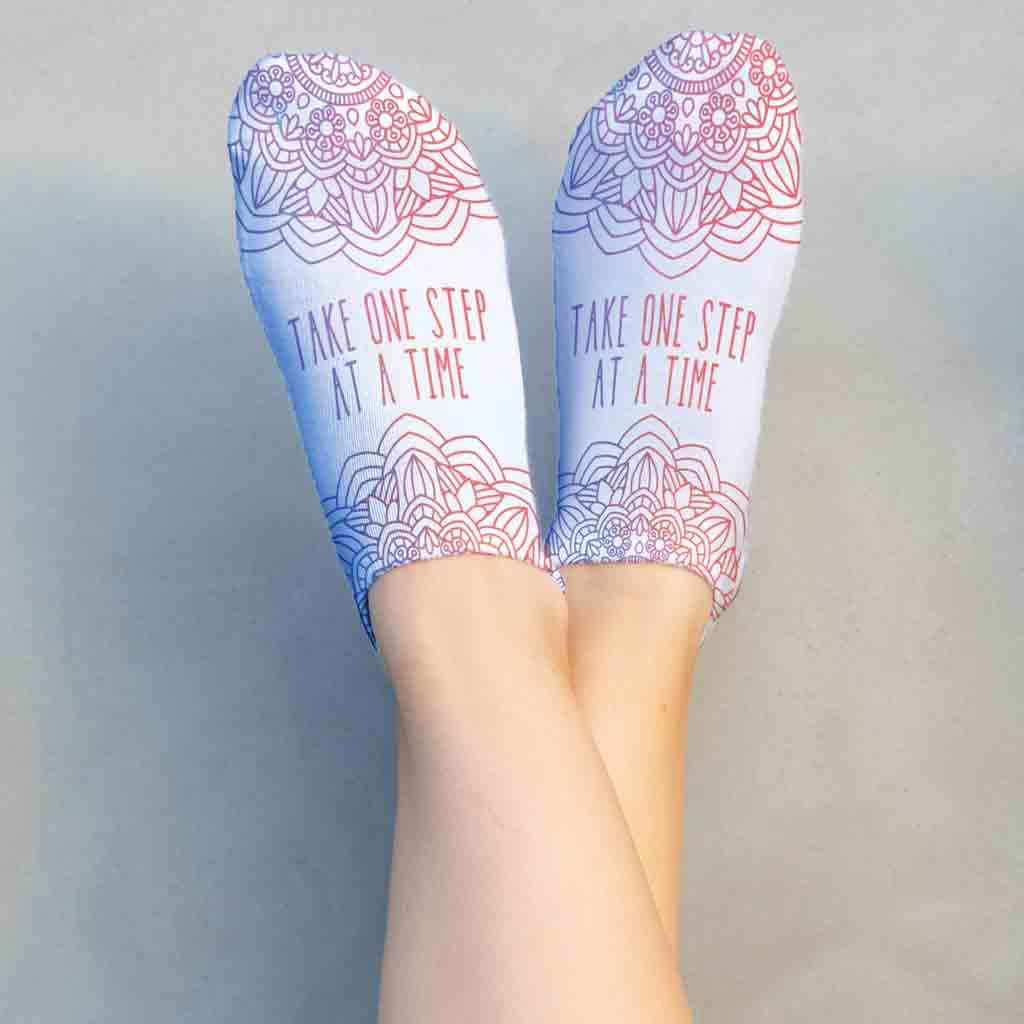 Take one step at a time self affirmation custom printed by sockprints on white cotton no show socks.