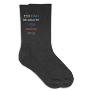 This Dad belongs to and his kids names digitally printed on the side of the socks.