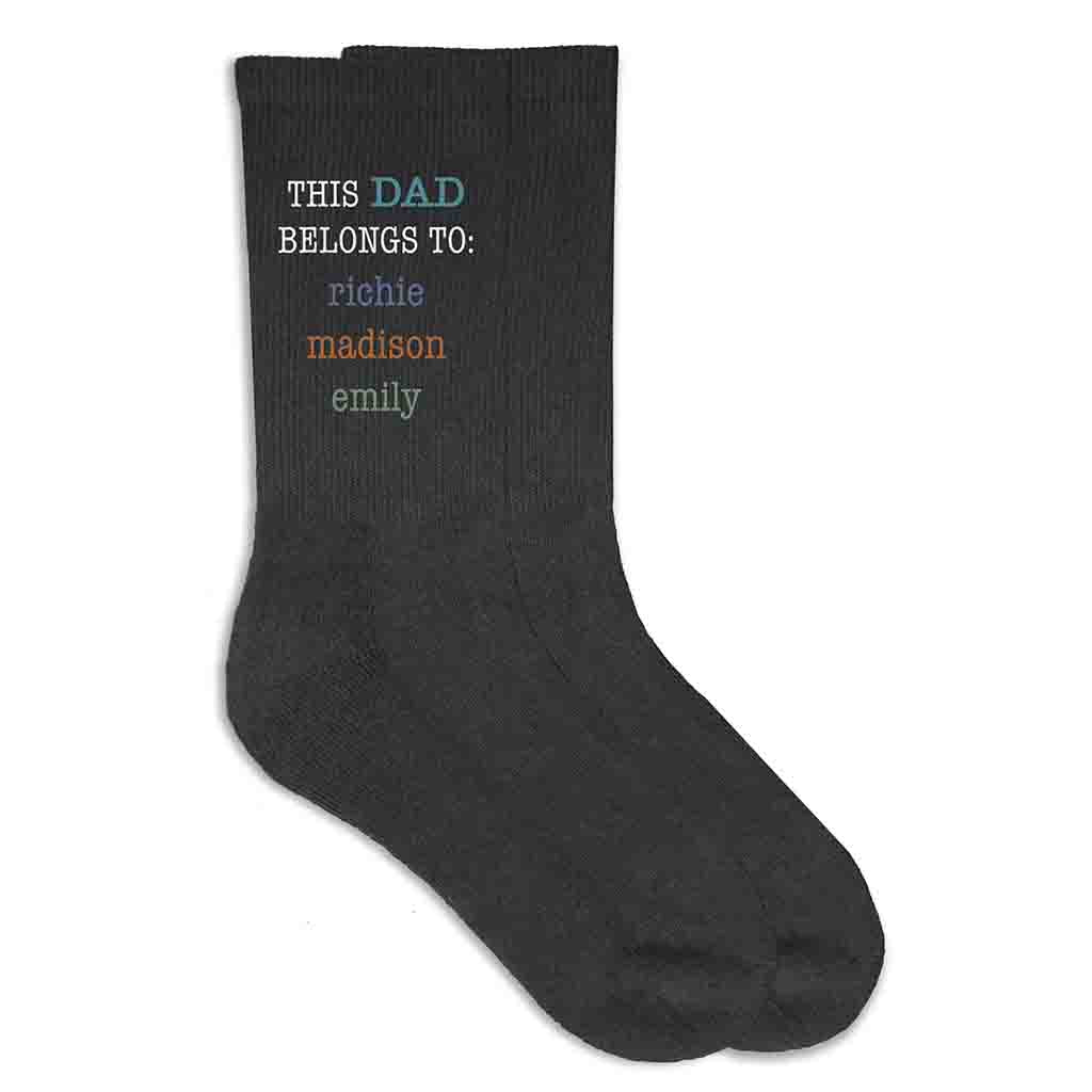 This Dad belongs to and his kids names digitally printed on the side of the socks.