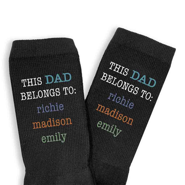 This Dad belongs to and his kids names digitally printed on the side of the socks.