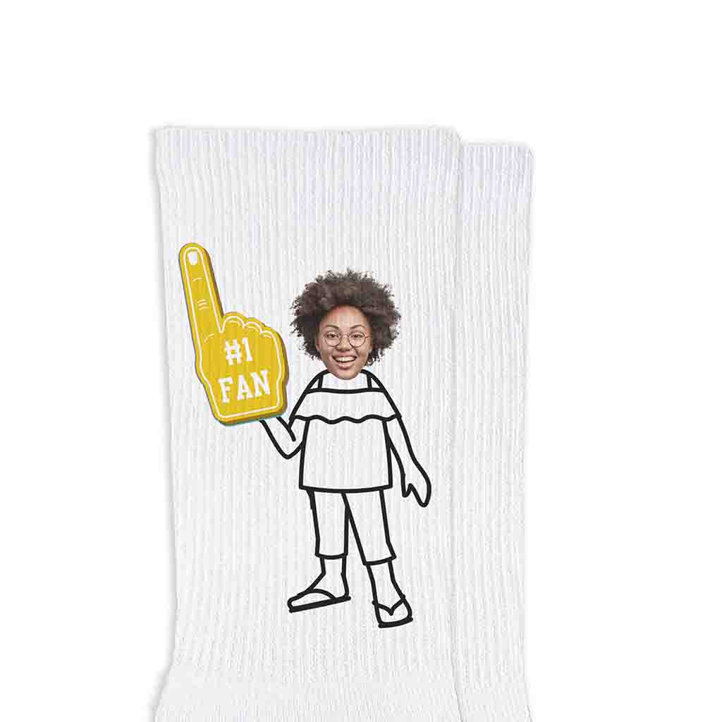 Custom printed yellow gold foam finger design personalized with your photo face cropped onto the body clothing character you select makes a great gift for sports fans.