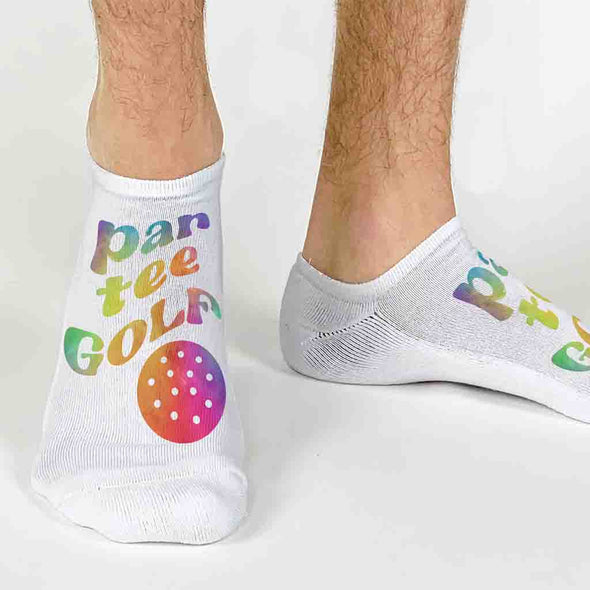 Have some fun wearing these custom printed mod “par tee” golf white cotton no show socks for a retro look.