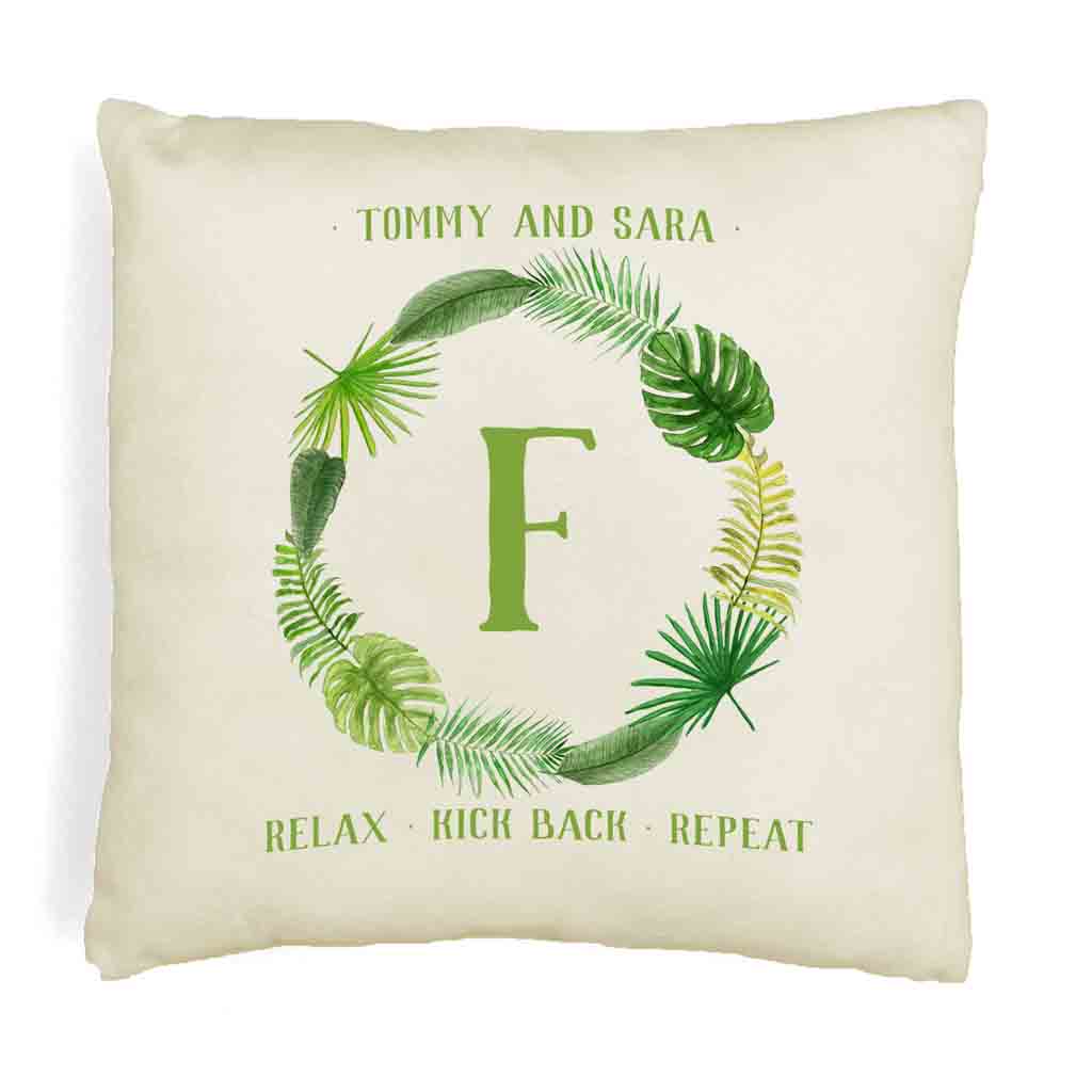 Super cute throw pillow cover custom printed with a tropical leaf design and your monogram initial.
