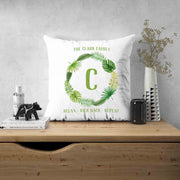 Custom printed throw pillow cover with tropical leaf design.