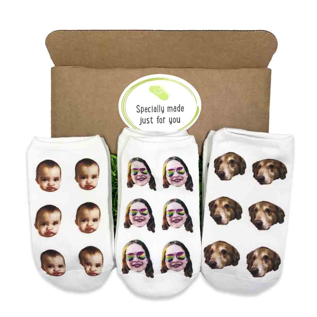 Custom printed photo faces on no show socks sold in a three pair gift box set..