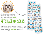 Custom dog photo socks personalized using your pets photo printed with your dogs face printed all over with blue hearts background.