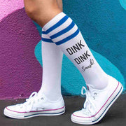 Pickleball design custom printed by sockprints on the side of striped knee high socks.