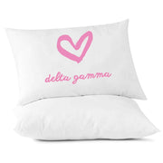 Sorority name in sorority colors and heart design custom printed on white cotton pillowcase.