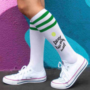 Pickleball design custom printed by sockprints on the side of striped knee high socks.