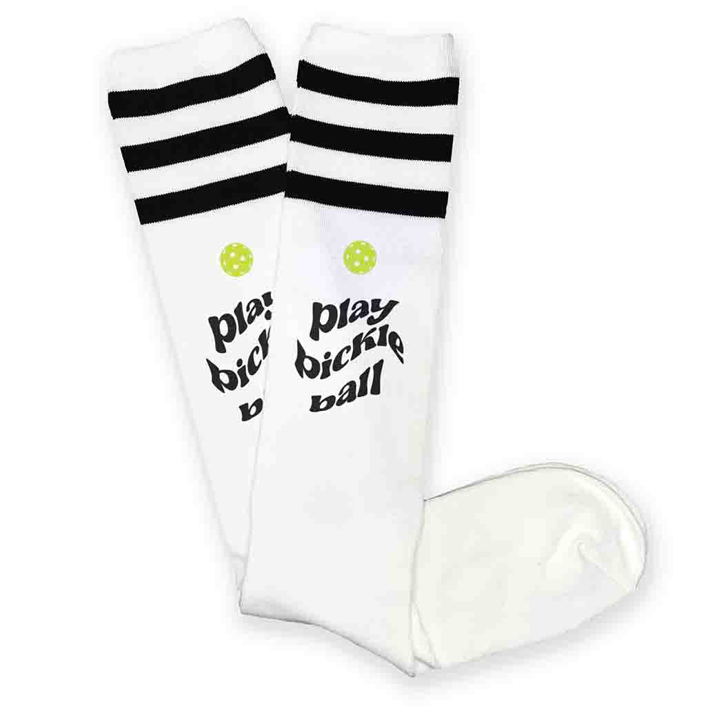 Play pickleball design by sockprints digitally printed on striped knee high socks.