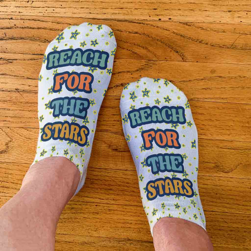 Reach for the stars self motivation design by sockprints on no show socks.